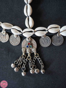 TOCADO KUCHI CON MONEDAS Y CONCHITAS