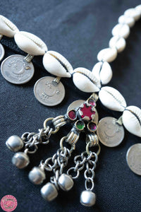 TOCADO KUCHI CON MONEDAS Y CONCHITAS