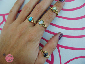 anillo dorado con piedra